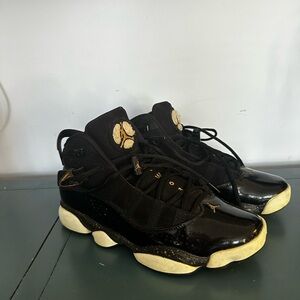 Nike Black and Gold Sneakers